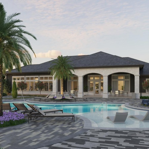 a swimming pool in front of a house