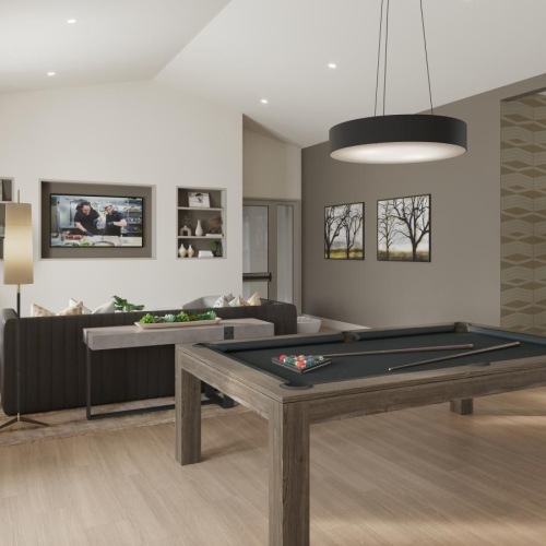 a room with a pool table and a large chandelier